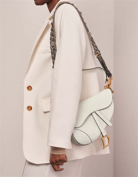 dior saddle bag white price|dior saddle bag street style.